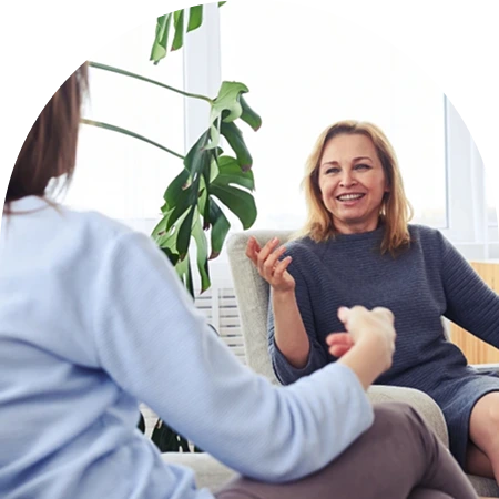 Women giving counsel to another woman
