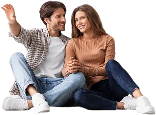 Happy Couple sitting down together