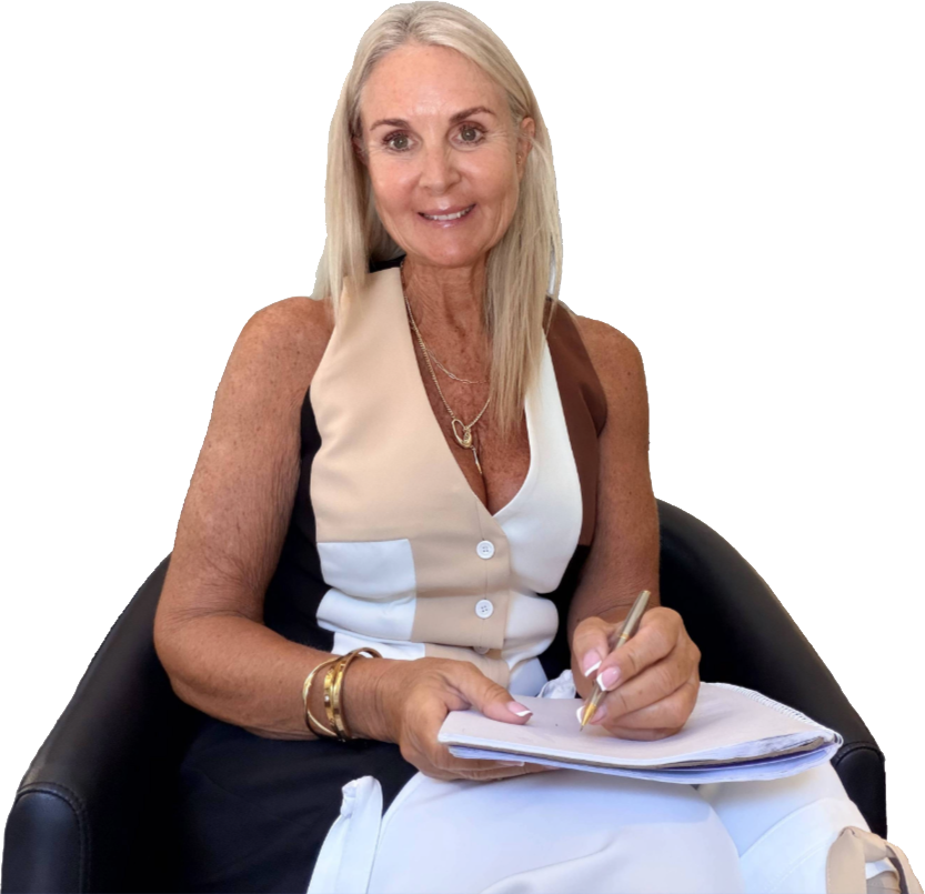 Kerryn seated with writing pad